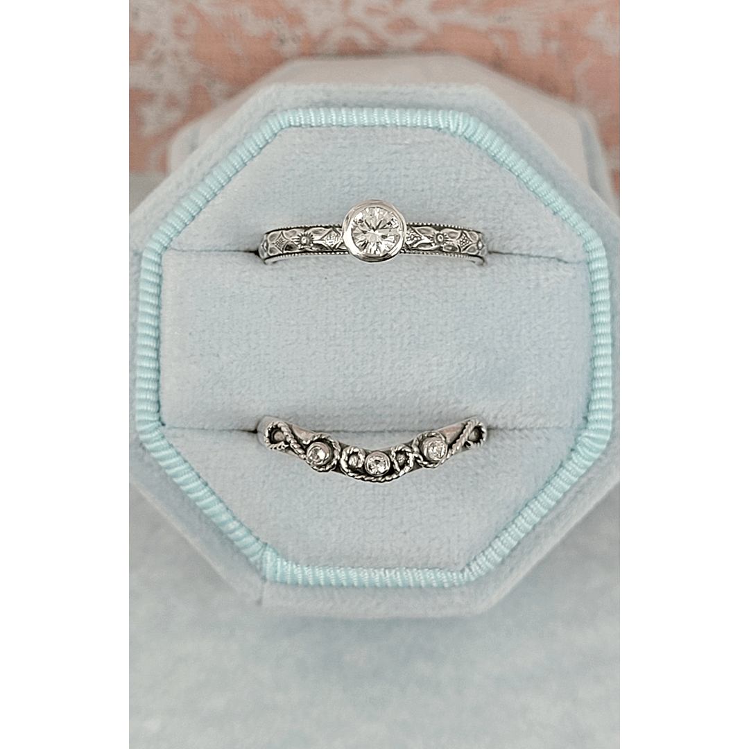 Vintage style white sapphire engagement ring and white sapphire scrollwork curved wedding band set in sterling silver in velvet box