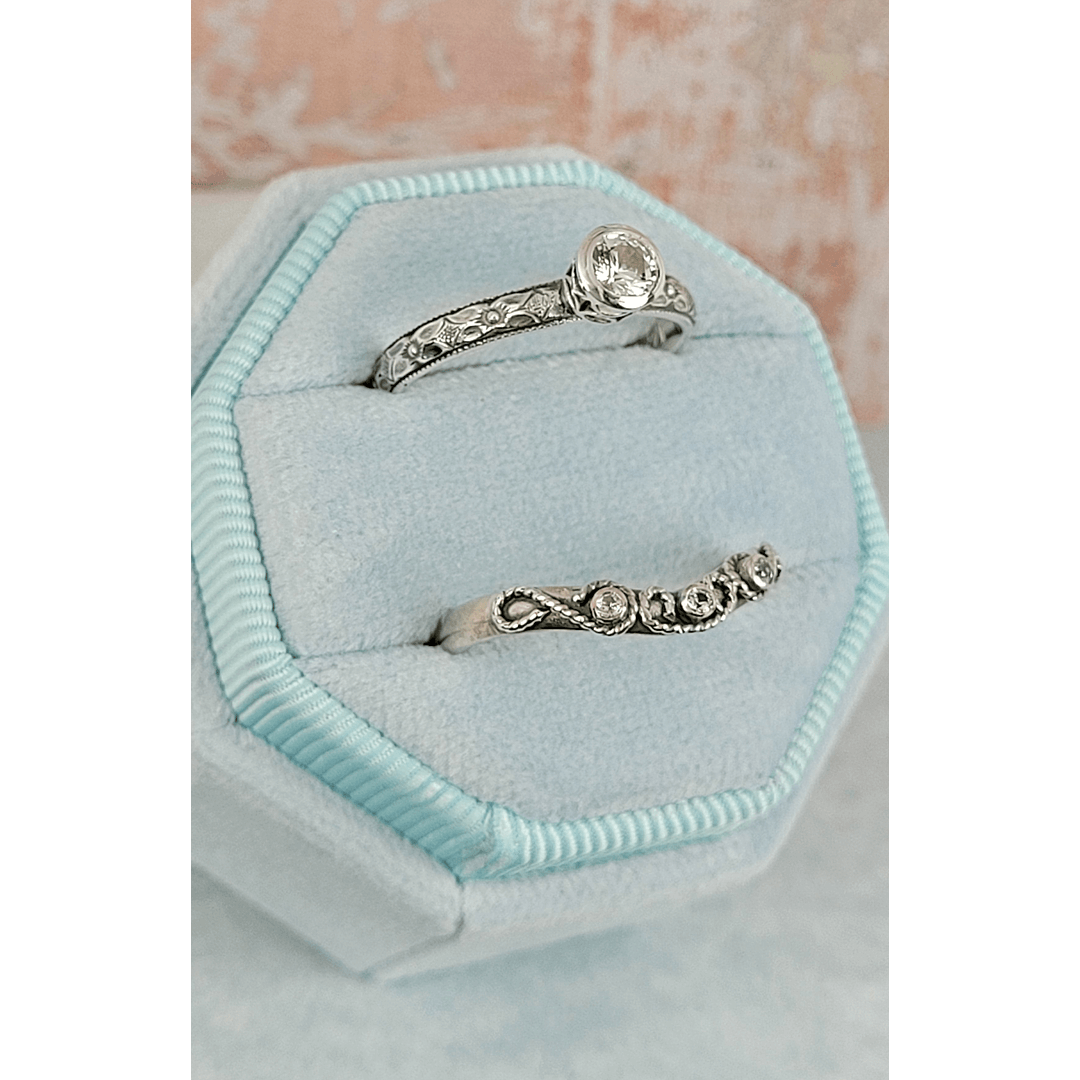Vintage style white sapphire engagement ring and white sapphire scrollwork curved wedding band set in sterling silver