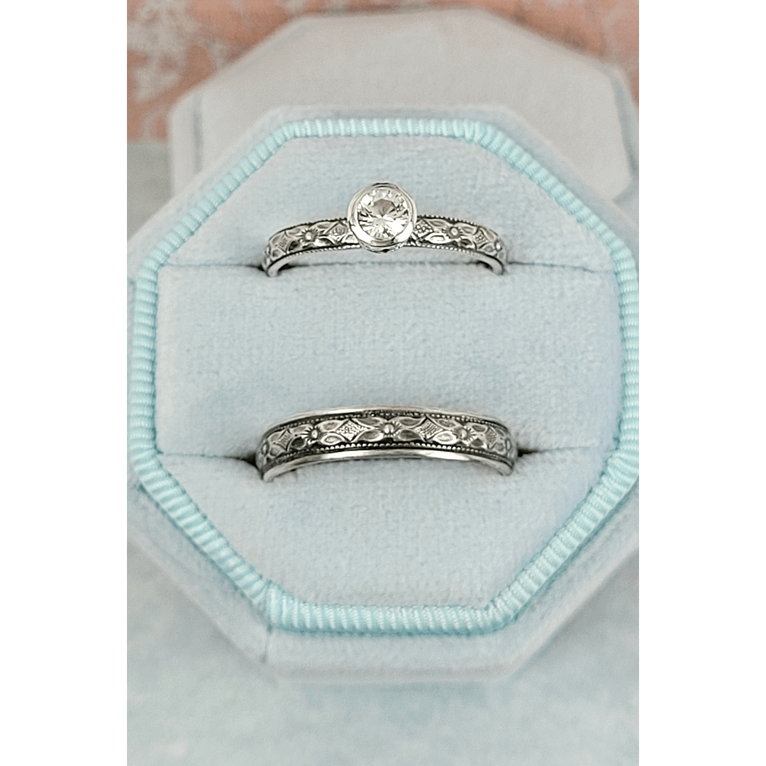 Vintage style white sapphire engagement ring and matching wedding band in sterling silver