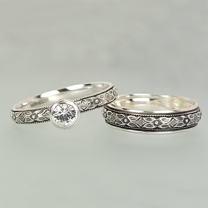 Vintage style white sapphire engagement ring and matching wedding band in sterling silver