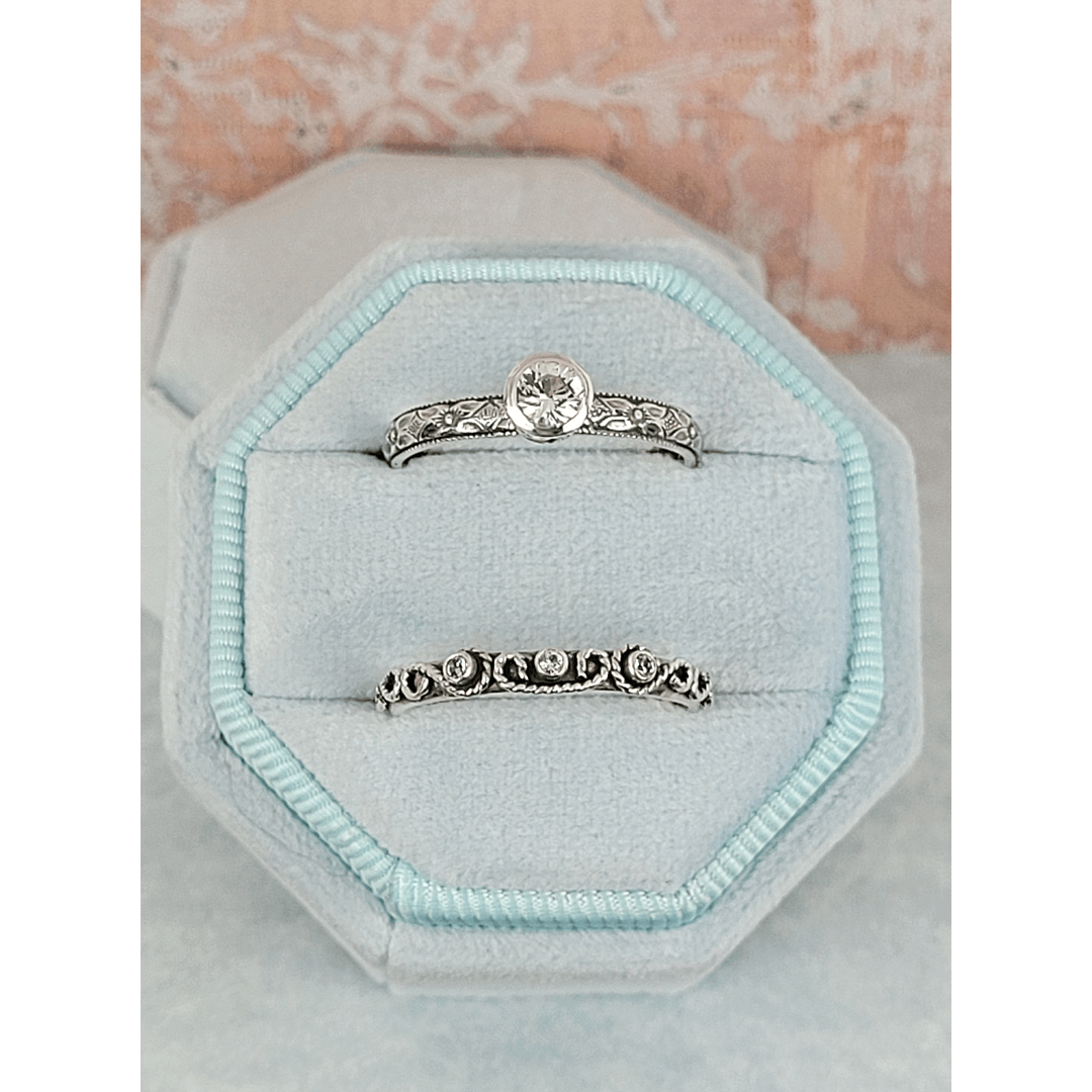 Vintage style white sapphire engagement ring and scrollwork white sapphire wedding band set in sterling silver in velvet box