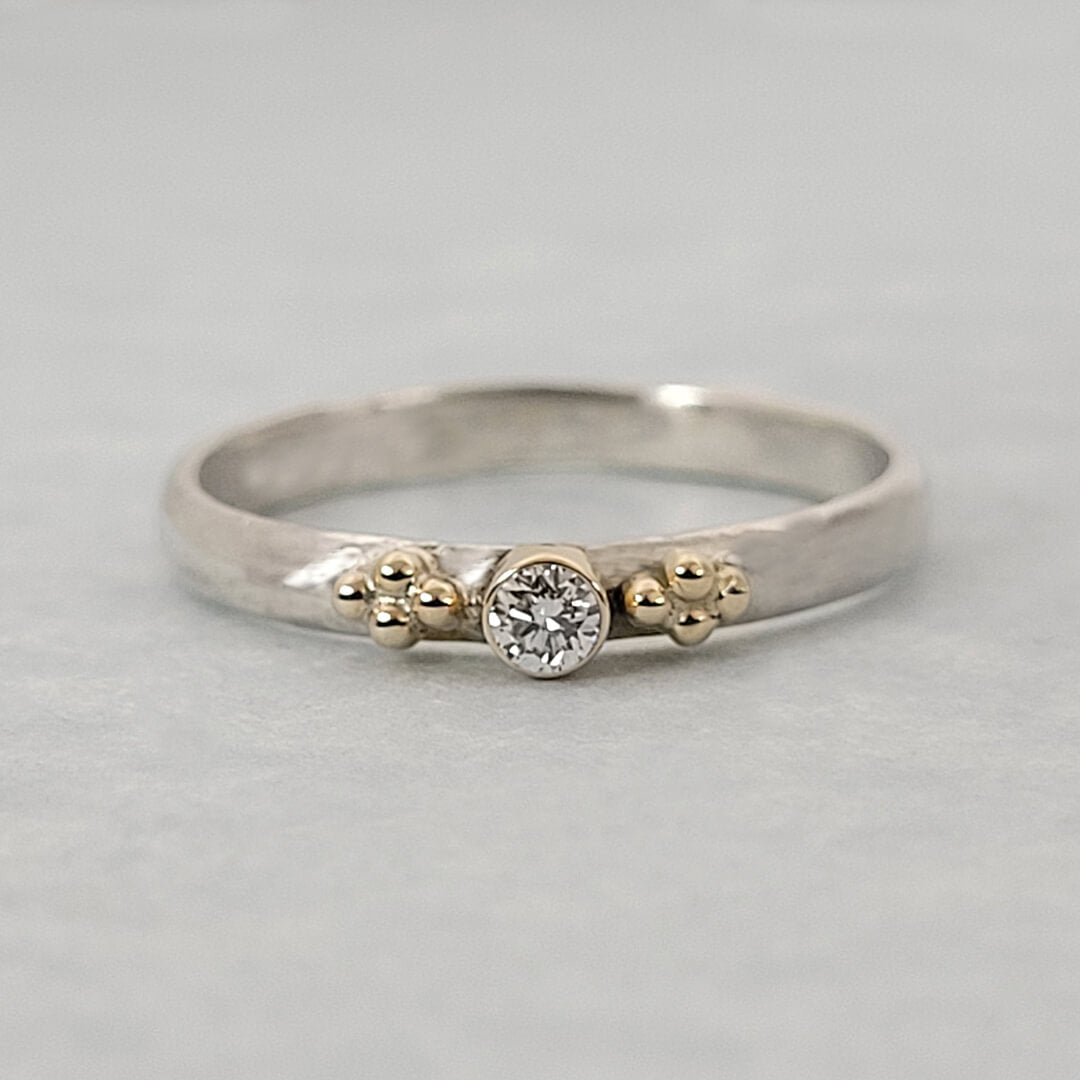 small diamond ring in sterling silver and 14kt gold