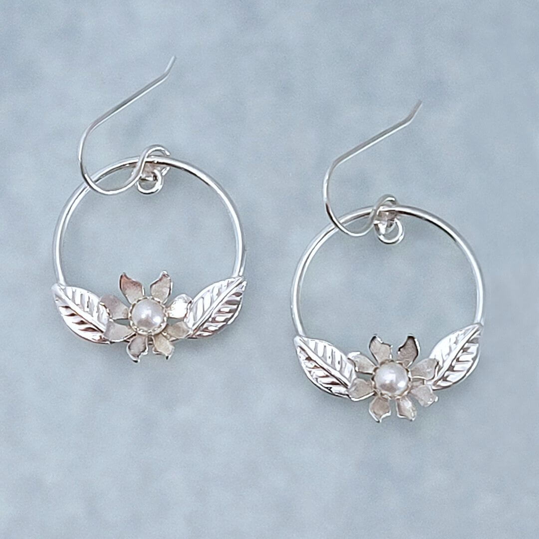 Wild flower hoop earrings in sterling silver with pearls