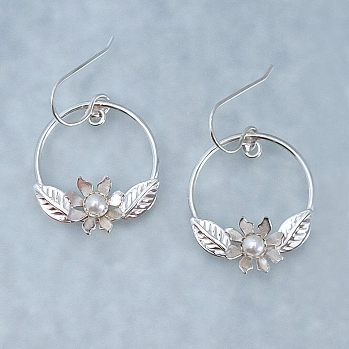 Wild flower hoop earrings in sterling silver with pearls