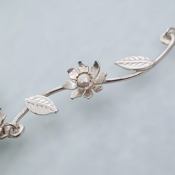 Close-up of Wild Flower Vine Necklace in Sterling Silver with Freshwater Pearls