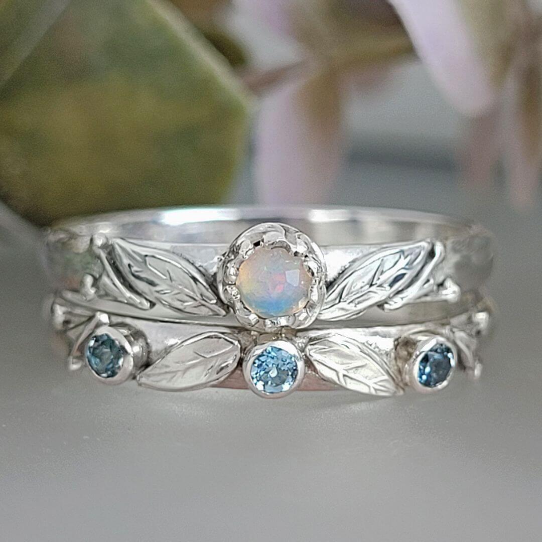 Nature-inspired willow leaf opal engagement ring and blue topaz willow leaf wedding band in sterling silver 