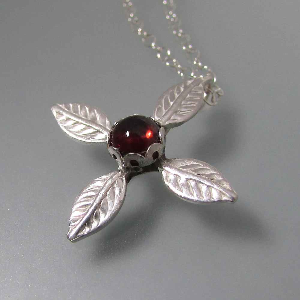 Ixora flower 4 petal cross necklace with garnet in sterling silver