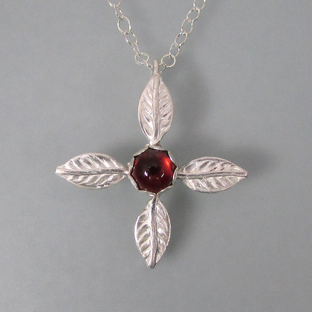 Ixora flower four petal cross necklace in sterling silver with garnet