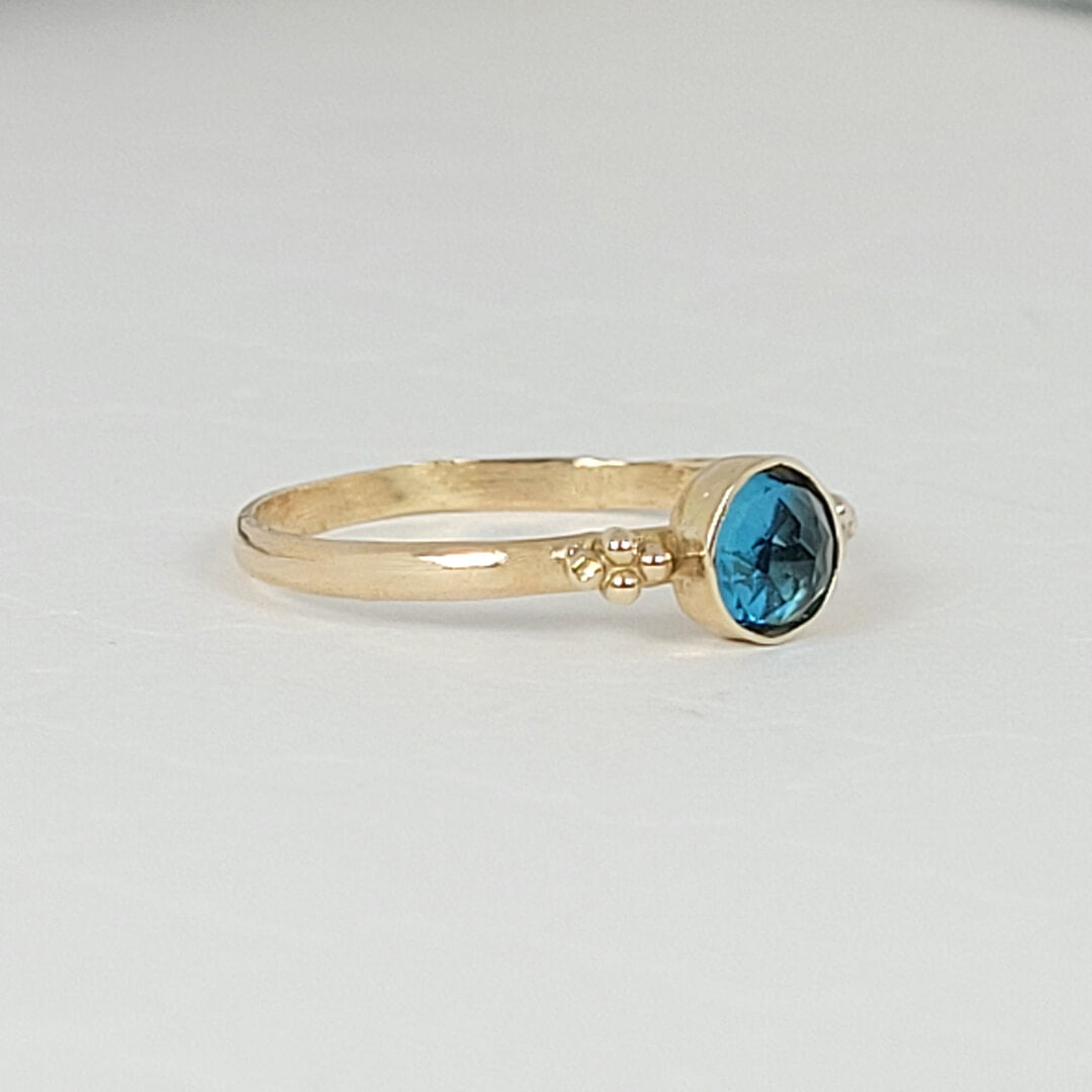 Rose cut London blue topaz ring in 14kt yellow gold