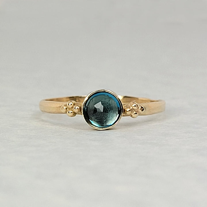London blue topaz engagement ring in 14kt yellow gold