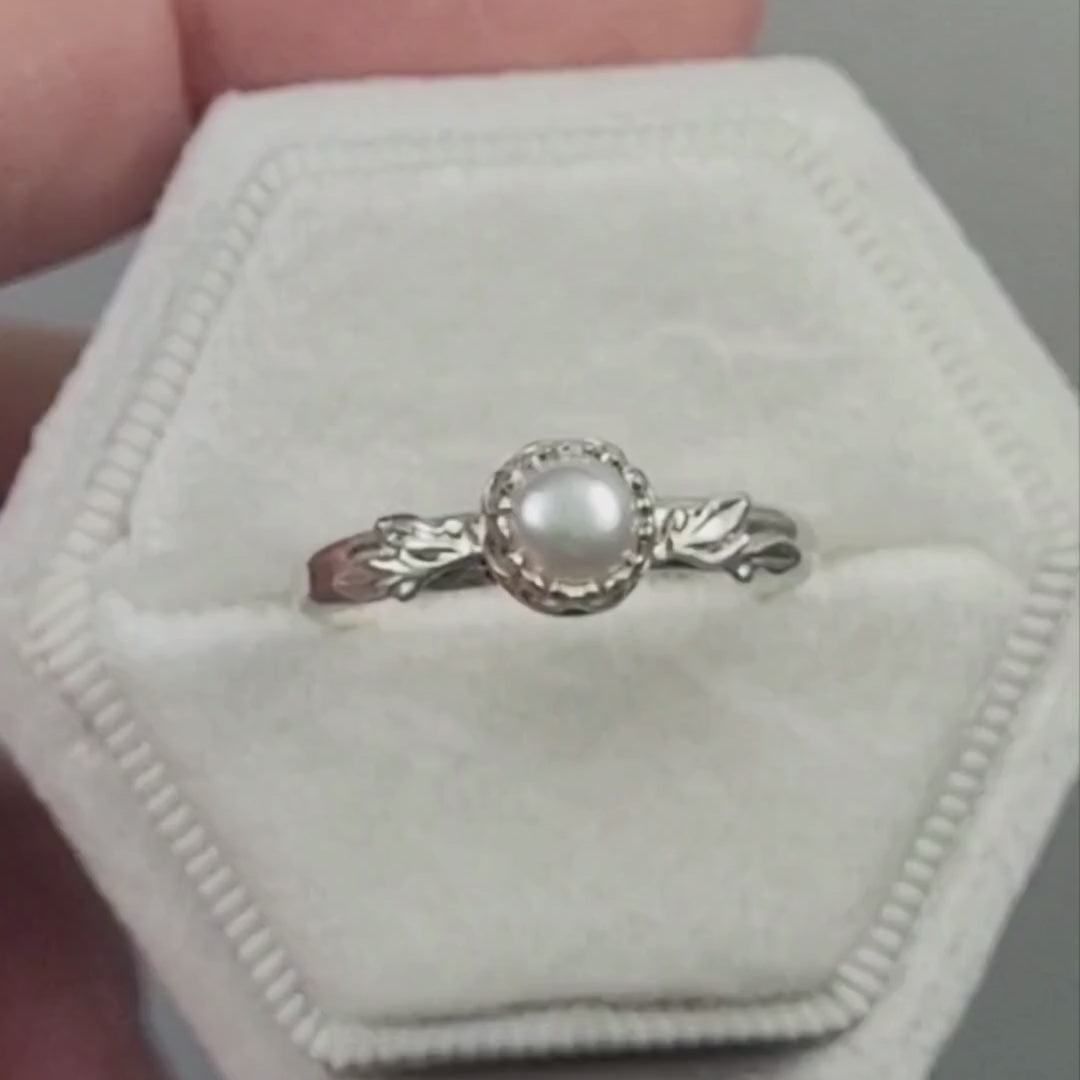 Pearl engagement ring with leaves in sterling silver