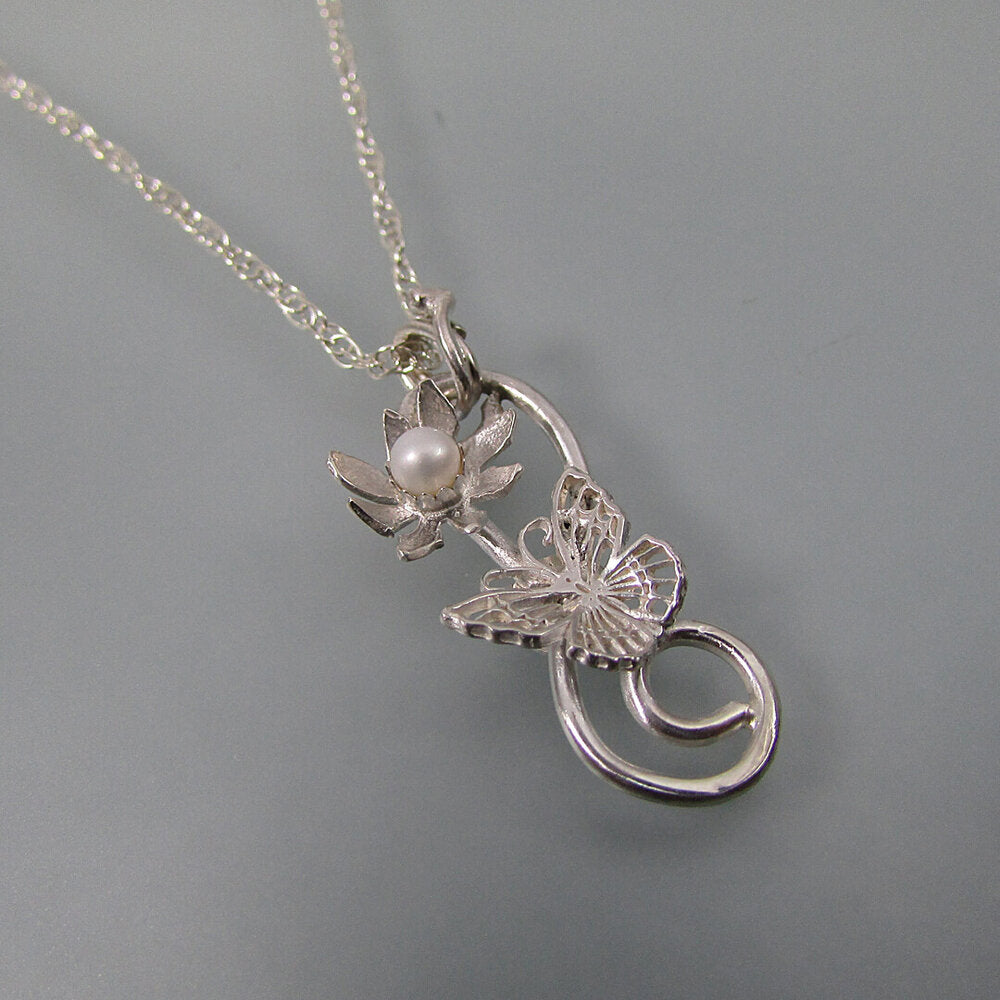 sterling silver butterfly necklace with flower and pearl