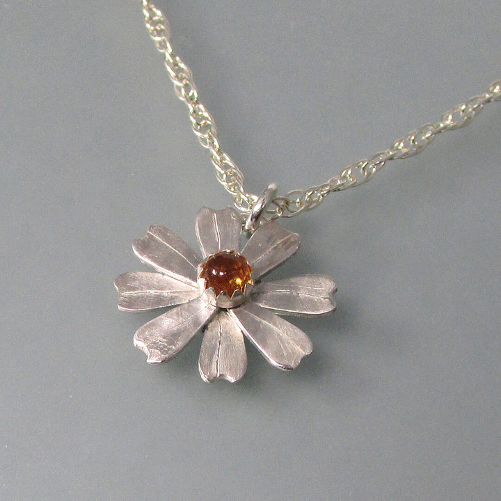 Silver daisy charm necklace with citrine