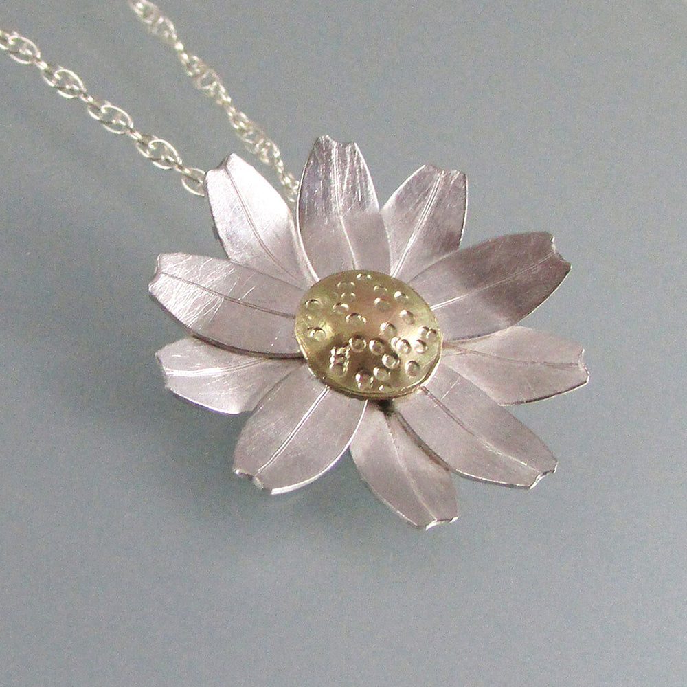 Sterling silver daisy flower necklace with 10kt gold
