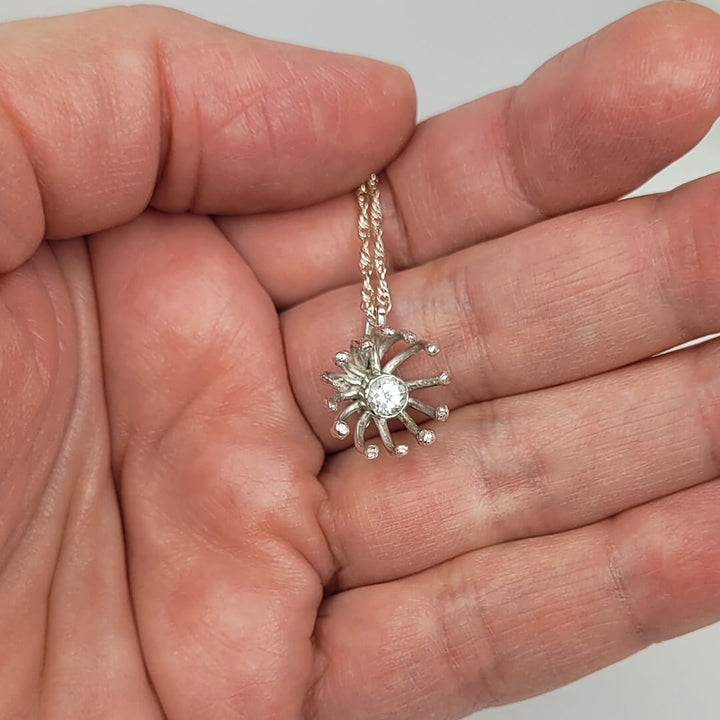 Dandelion puff necklace in sterling silver with white topaz