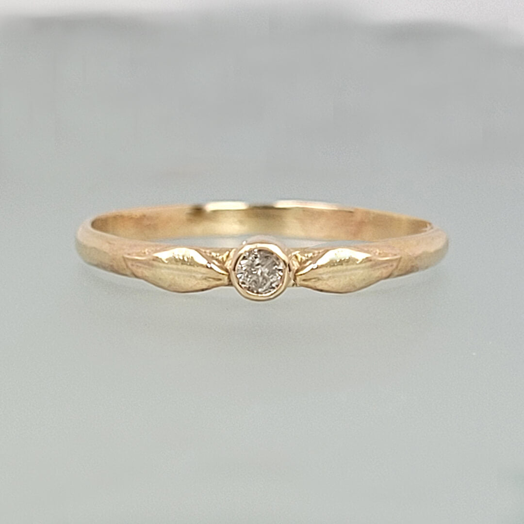 small diamond ring with leaves in 14kt gold