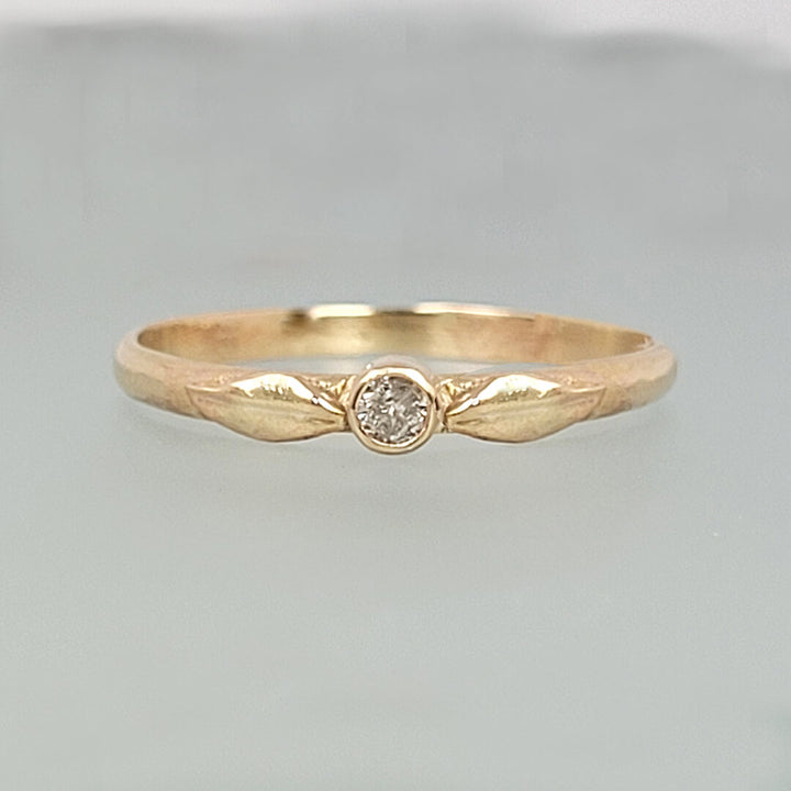 small diamond ring with leaves in 14kt gold