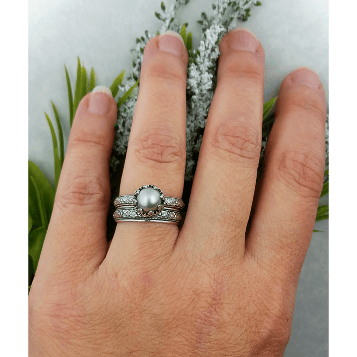 Edwardian inspired gray pearl engagement ring with matching women's wedding ban