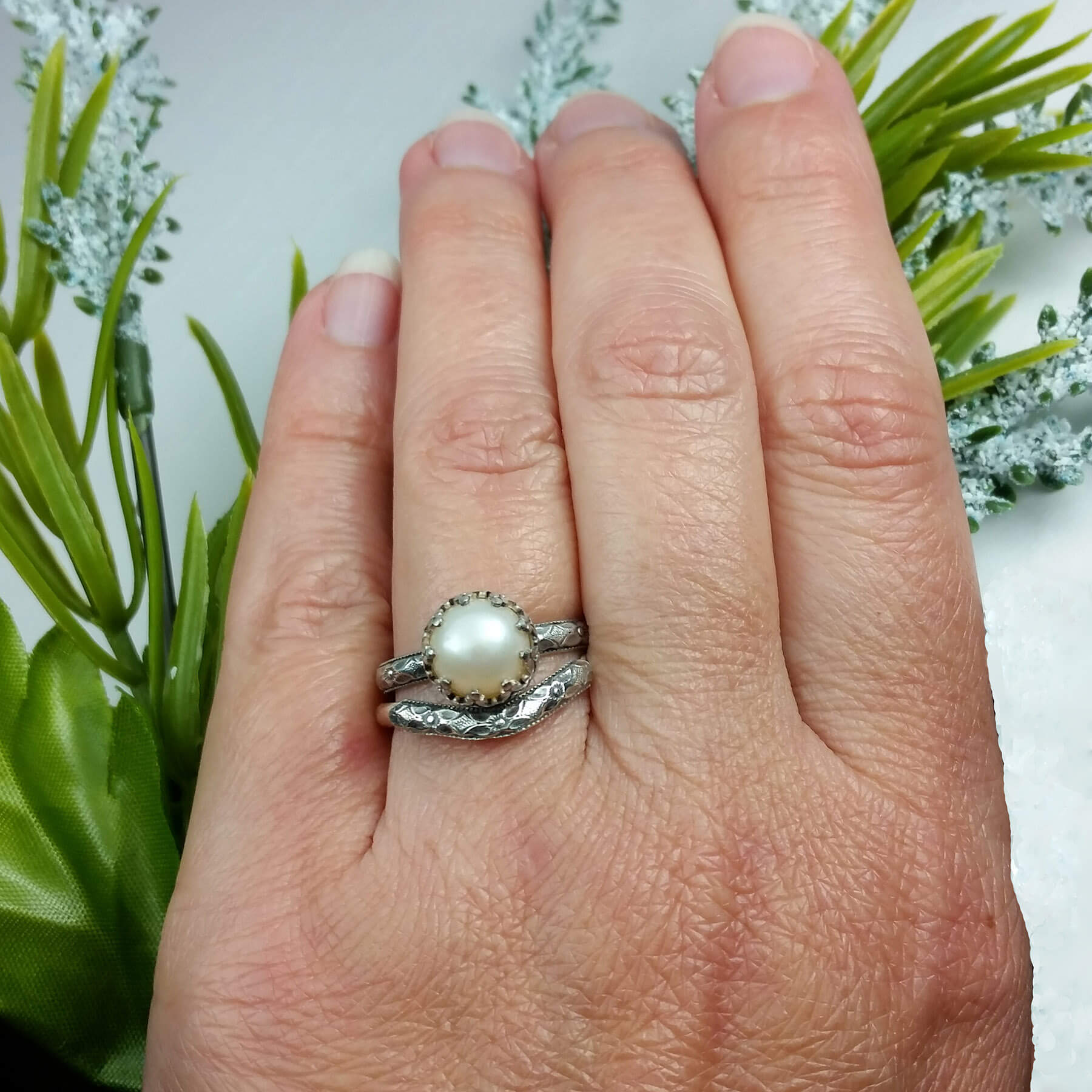 Edwardian inspired vintage style pearl engagement ring and curved wedding band set on model 