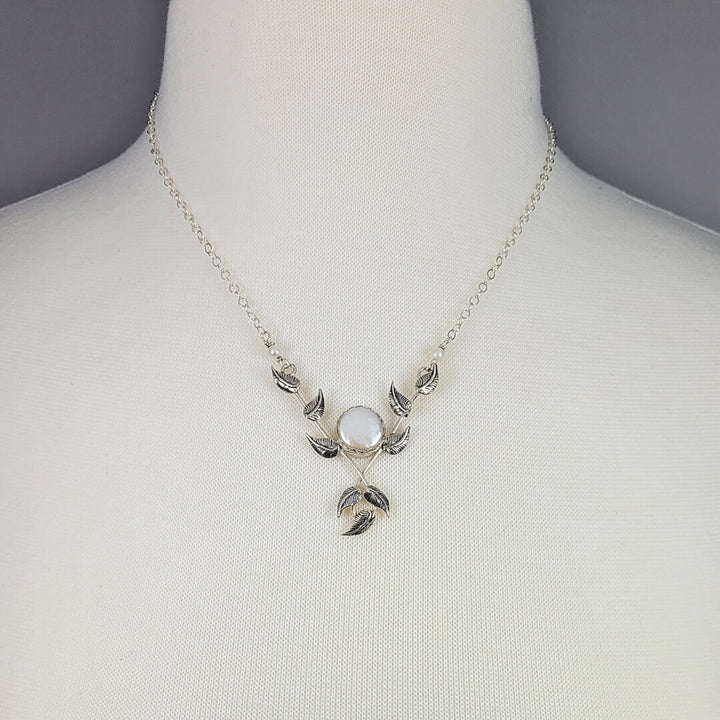 Vine and leaf necklace with flat coin pearl in sterling silver
