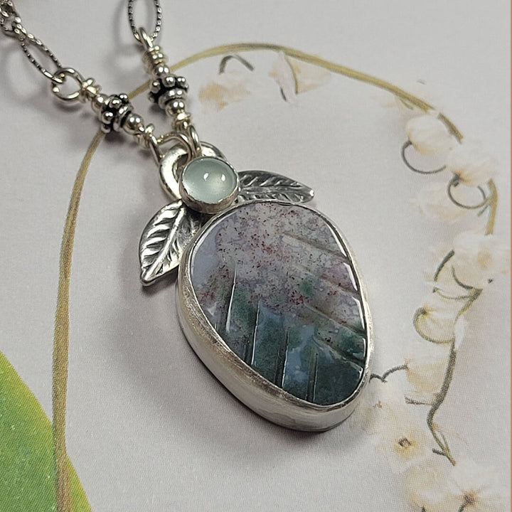 carved fancy agate leaf necklace with aquamarine