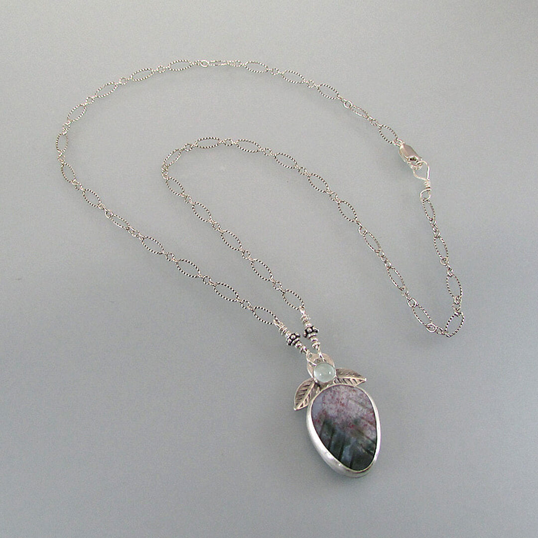 Carved agate leaf necklace with aquamarine