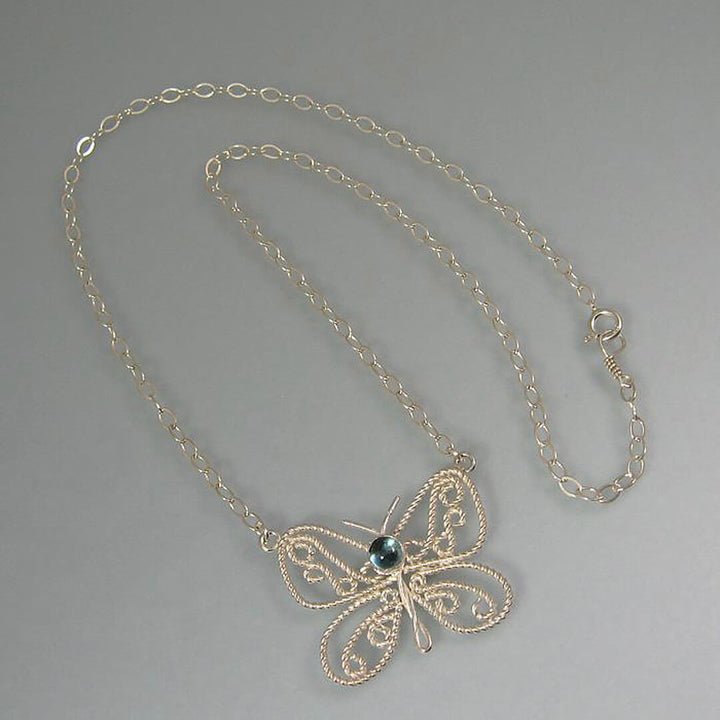 sterling silver filigree butterfly necklace with Swiss blue topaz