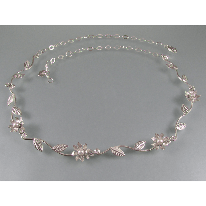 Sterling silver wildflower vine necklace with flowers, leaves and pearls