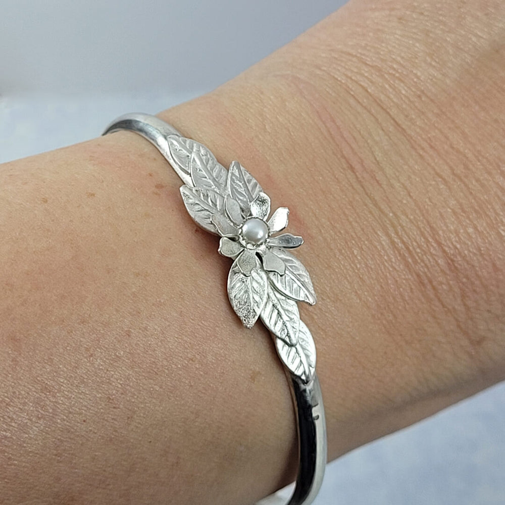 Sterling silver cuff bracelet with flower and pearl