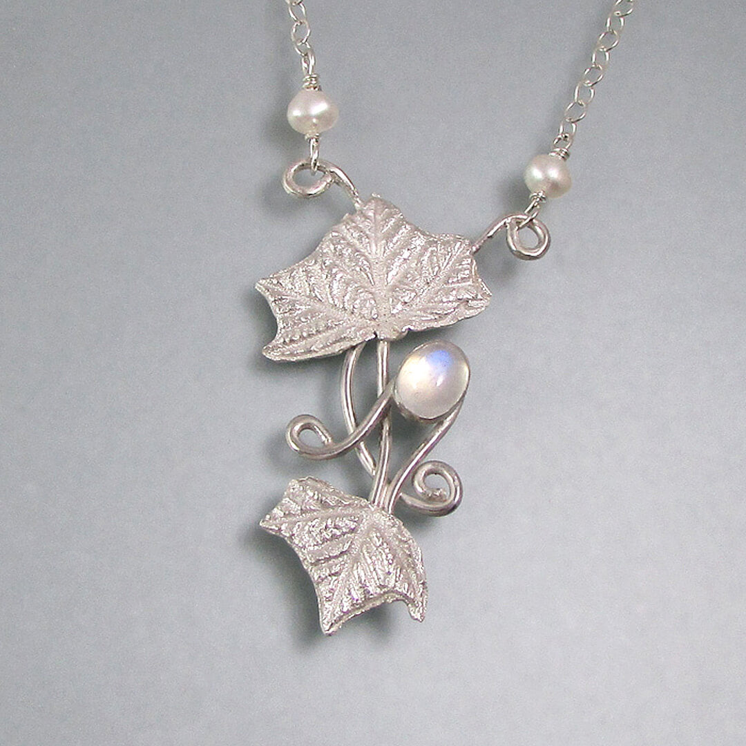 real leaf necklace with rainbow moonstone in sterling silver