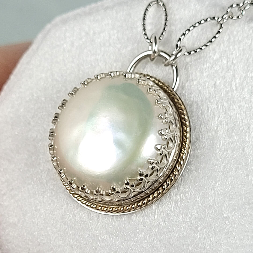 large white coin pearl pendant necklace in silver and gold