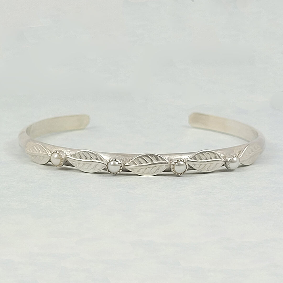 Sterling silver cuff bracelet with pearls, nature-inspired 