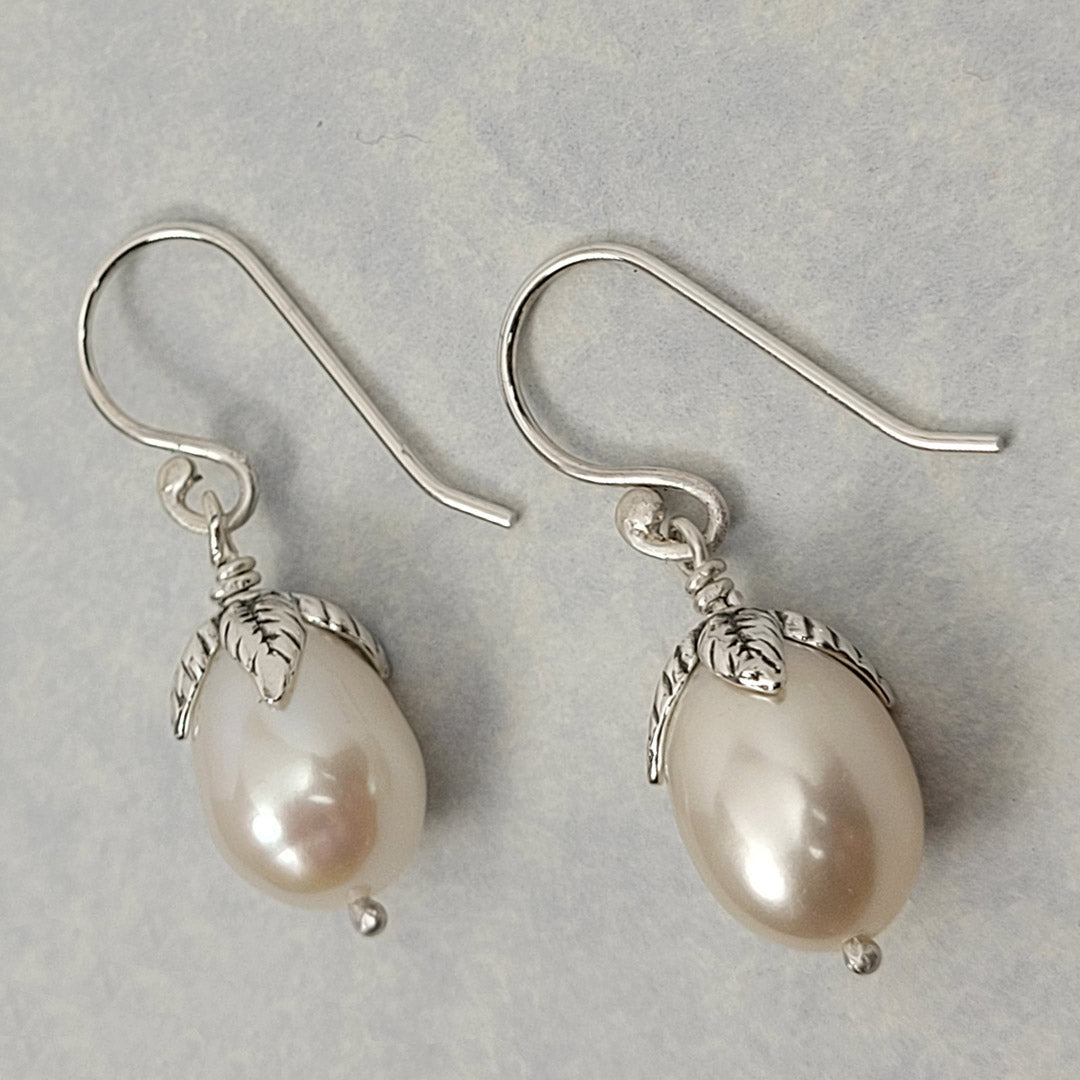 leafy pearl drop earrings in sterling silver