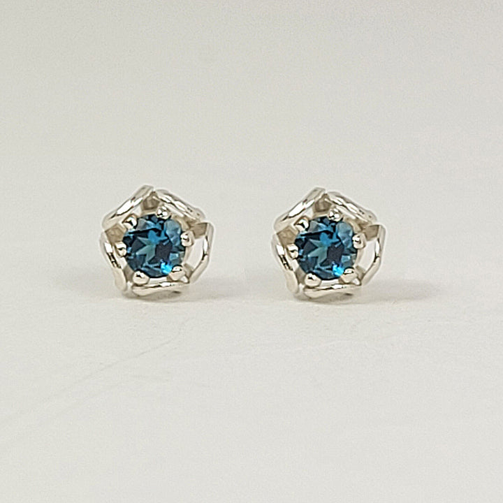 small stud earrings with London blue topaz