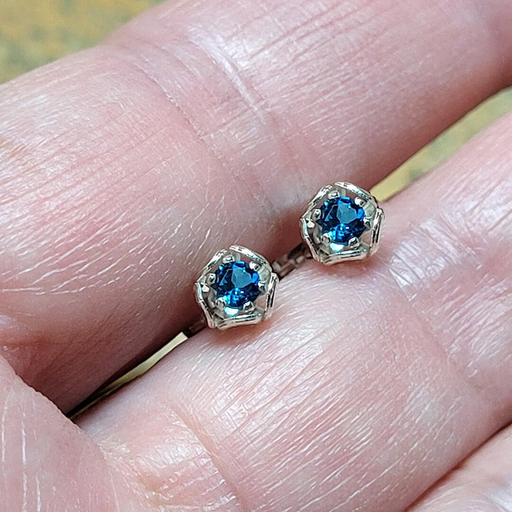 Sterling silver bud stud earrings with London blue topaz
