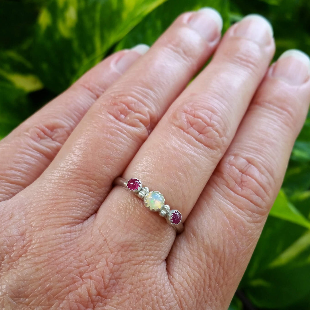 three stone opal and ruby ring in sterling silver