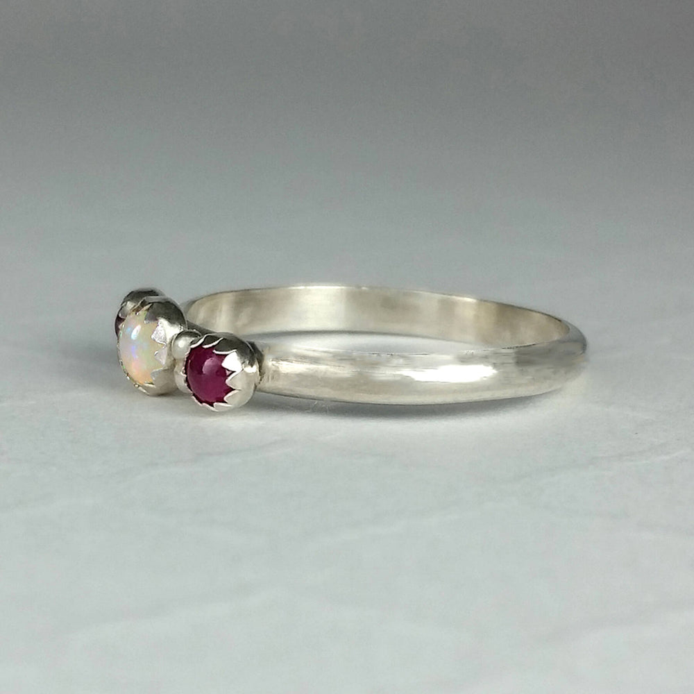 three stone opal and ruby ring
