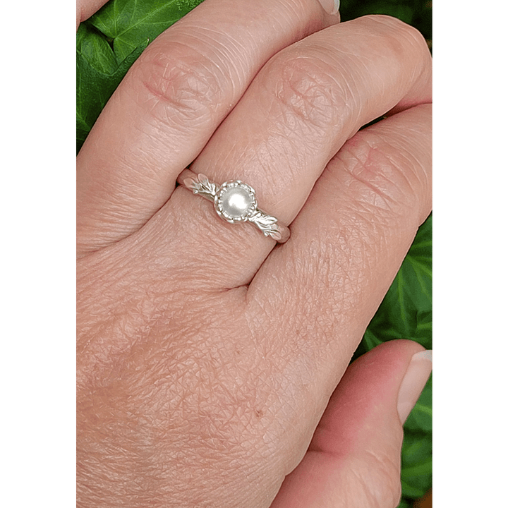 Pearl engagement ring with leaves in sterling silver