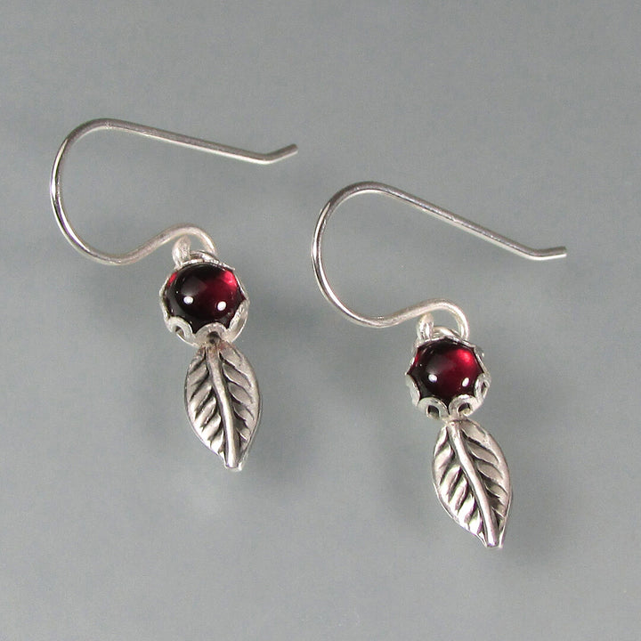 Petal garnet drop earrings in sterling silver