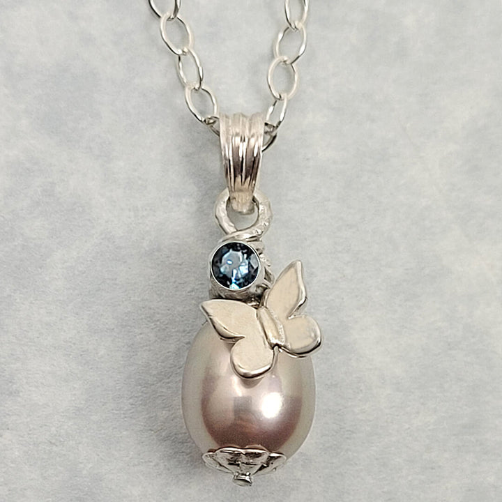 butterfly pearl necklace with London blue topaz in sterling silver