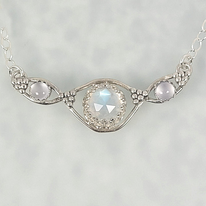 rainbow moonstone double infinity necklace with blue chalcedony