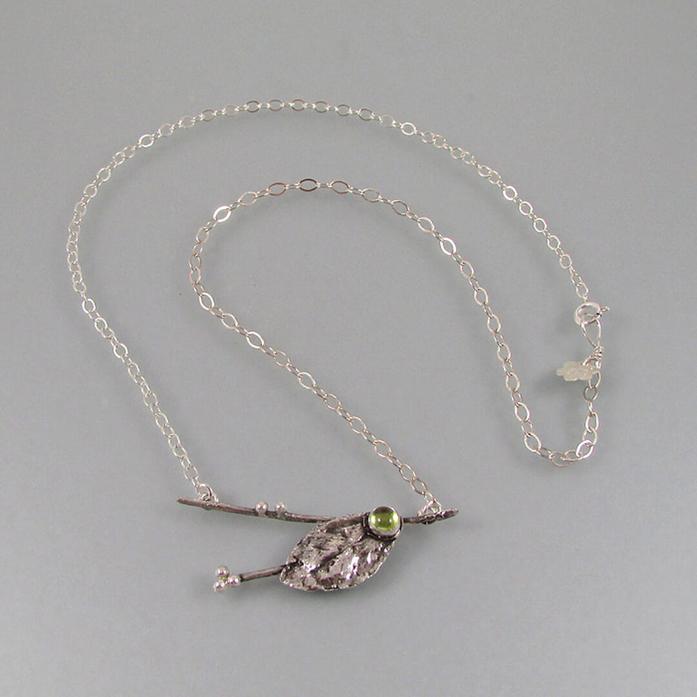 sterling silver real leaf and branch necklace with peridot