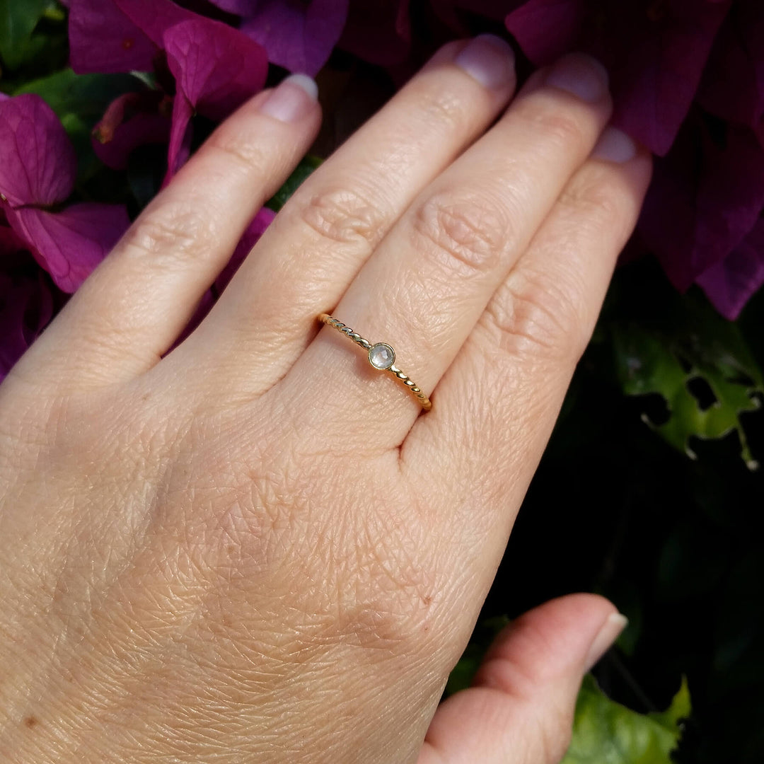 Rose cut diamond mini solitaire ring with twisted band in 14kt gold