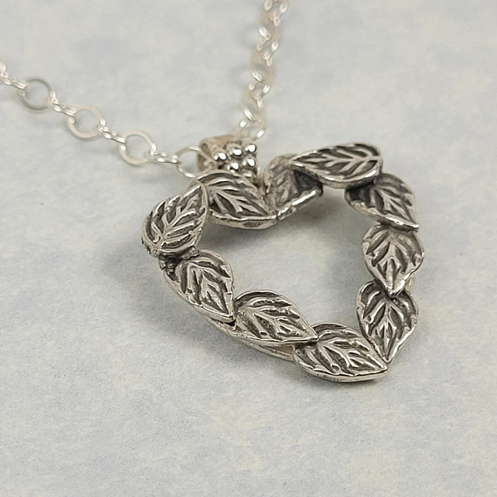Sterling silver heart-shaped necklace with leaves