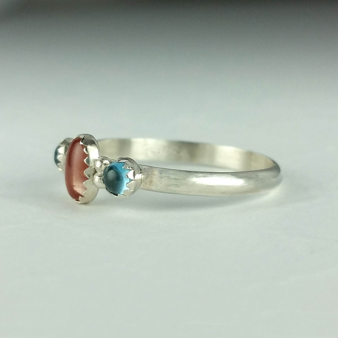 Peach Oregon sunstone Ring with London blue topaz in sterling silver