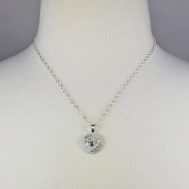 Leaf Bordered Swiss Blue Topaz Necklace in Sterling Silver