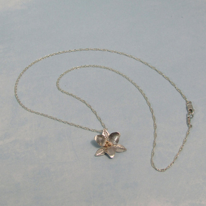 Trillium flower necklace in sterling silver with 14kt gold granulation