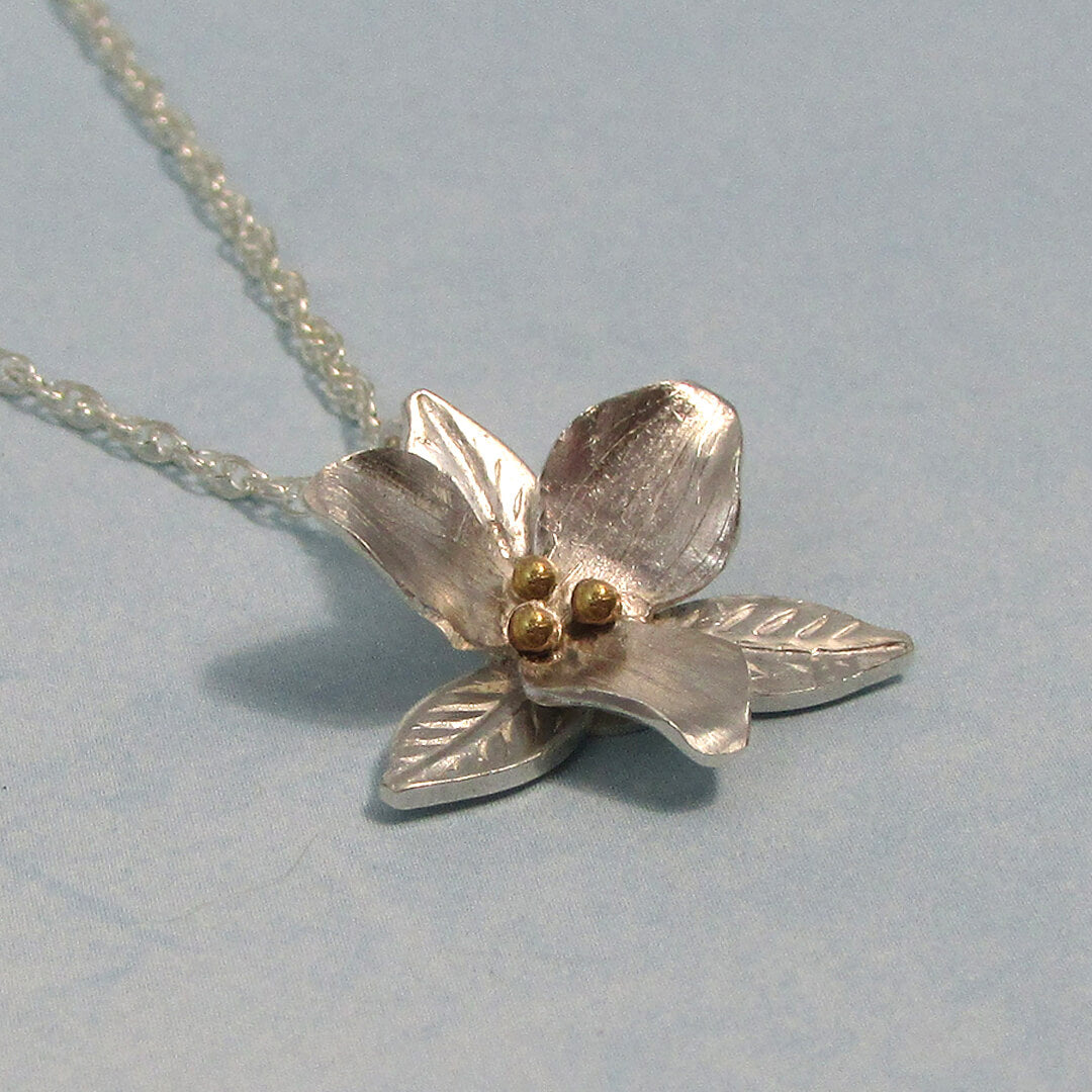 Trillium flower necklace in sterling silver and 14kt gold