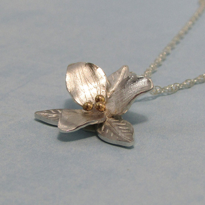 Silver trillium flower necklace with 14kt gold center