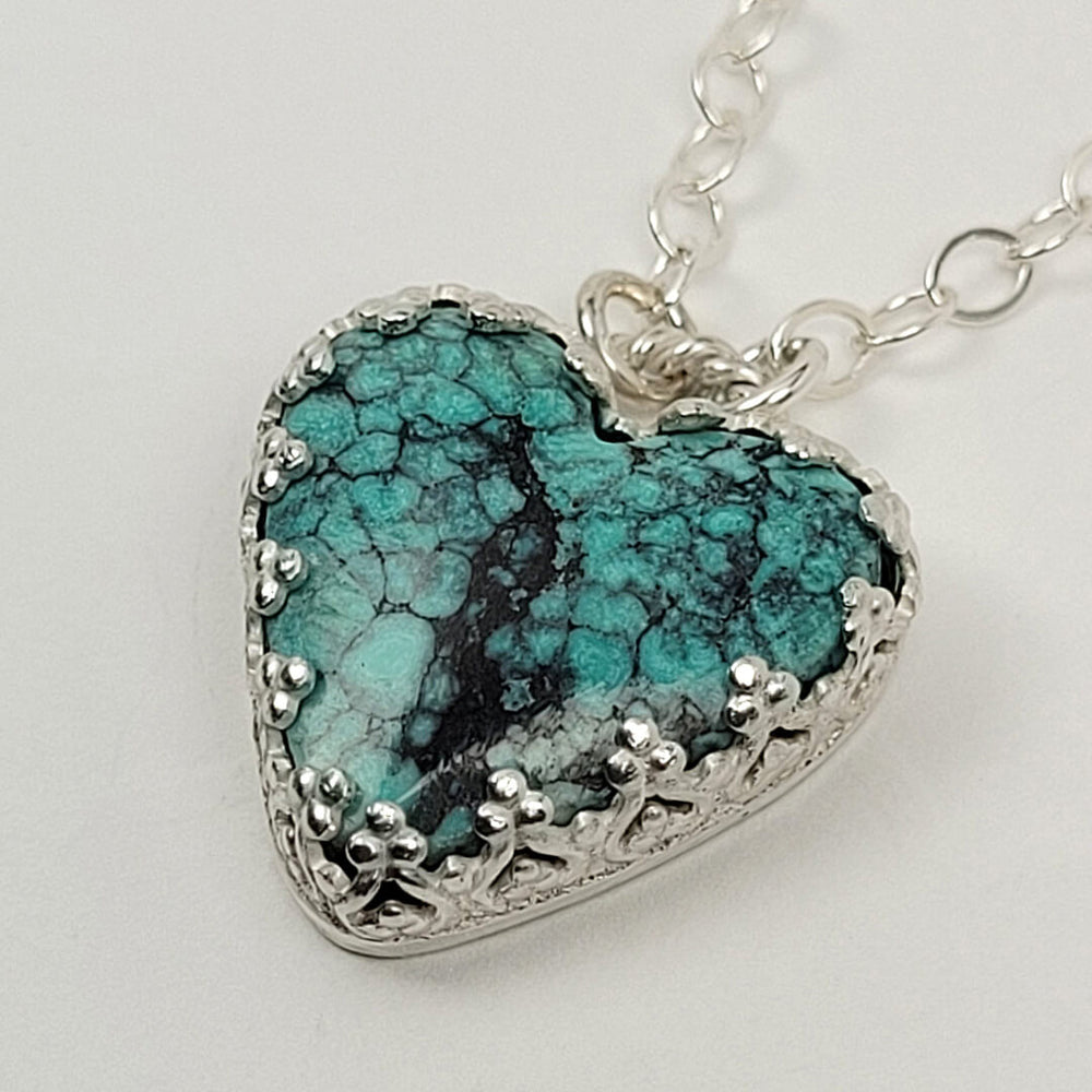 turquoise heart necklace with crown setting in sterling silver